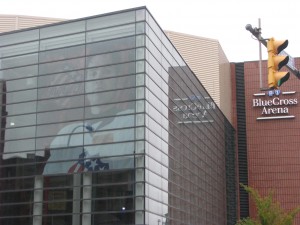 Chris Taylor on the windows of Blue Cross Arena